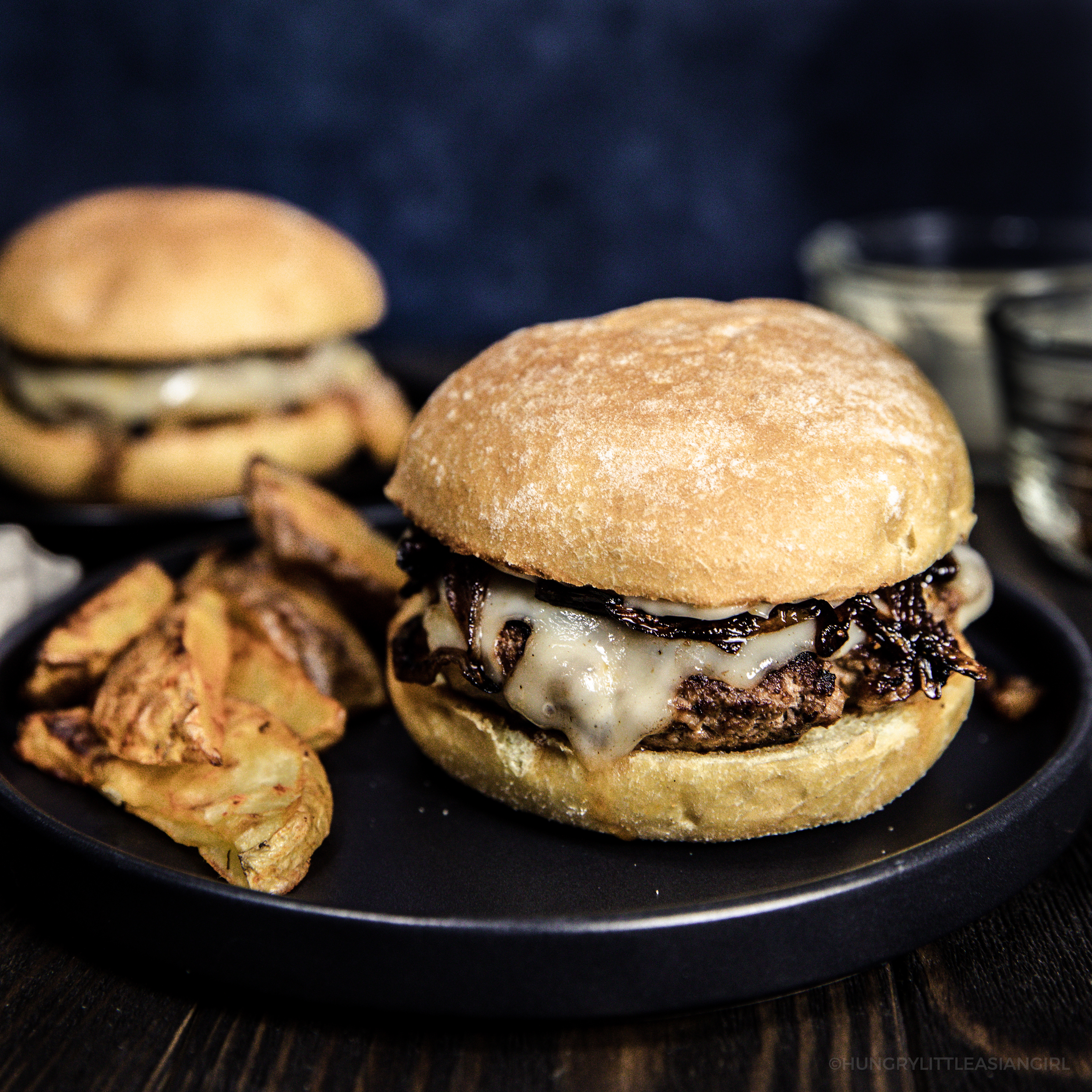 burgers with caramelized onions and Swiss cheese